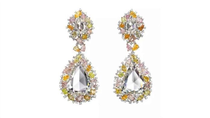 Red Carpet earrings set with over 30 carats of rose cuts with a surround of natural fancy-coloured diamonds