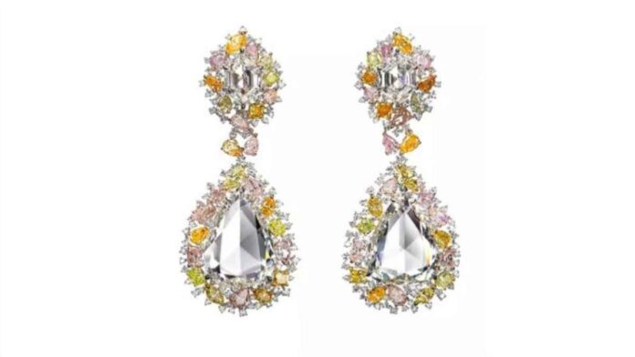 Red Carpet earrings set with over 30 carats of rose cuts with a surround of natural fancy-coloured diamonds