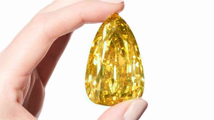 303-carat golden canary set sells for $12.4 million at New York Sotheby's auction