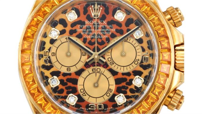 Elton Johns yellow gold leopard print Rolex sold for $176,400 Elton Johns yellow gold leopard print Rolex sold for $176,400